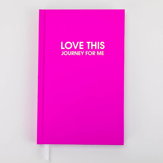 Snarky "Love This Journey For Me" journal with vibrant fuchsia cover, gold foil printing, and white page marking ribbon for fun journaling.