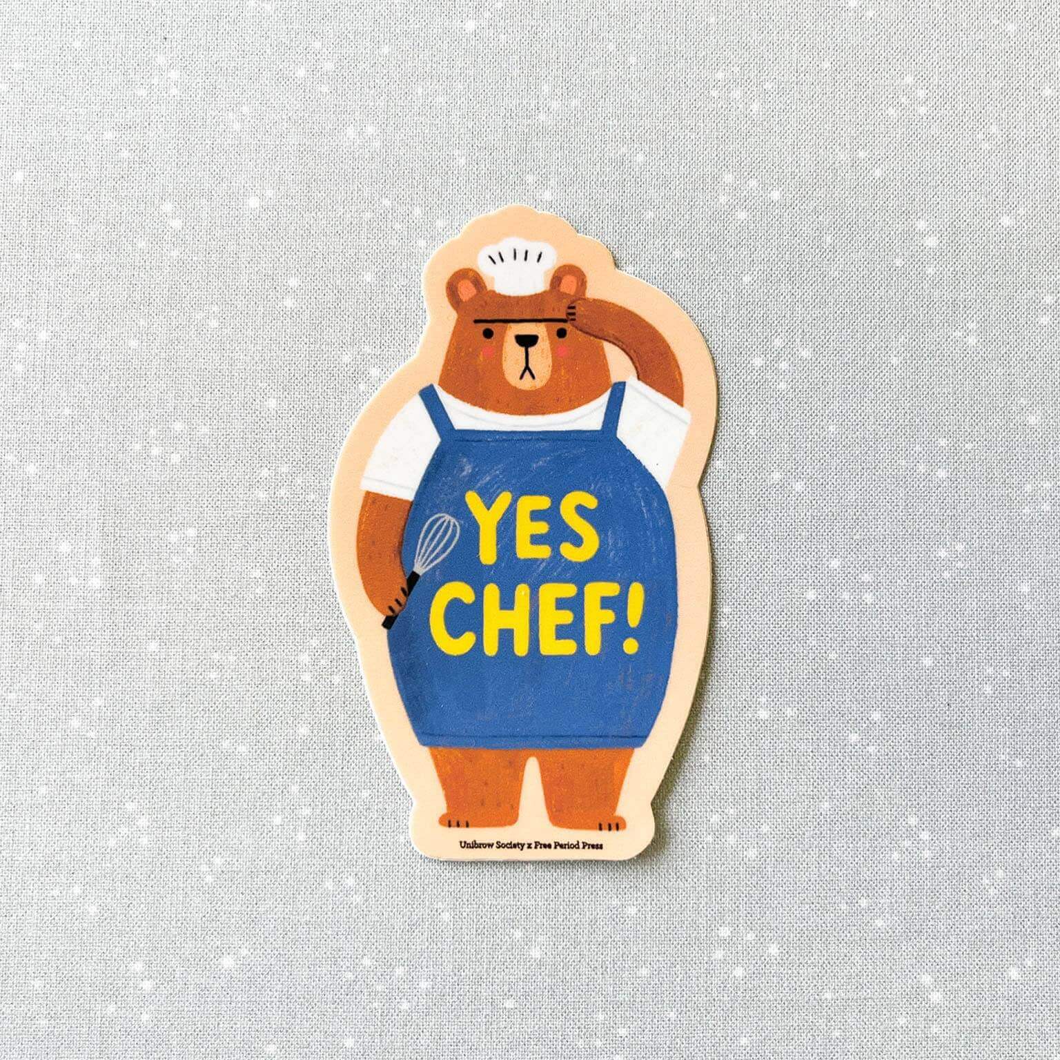 Yes Chef Bear vinyl decal sticker in blue apron, perfect for journaling supplies and guided journaling. Adds a cute touch to your kitchen items.