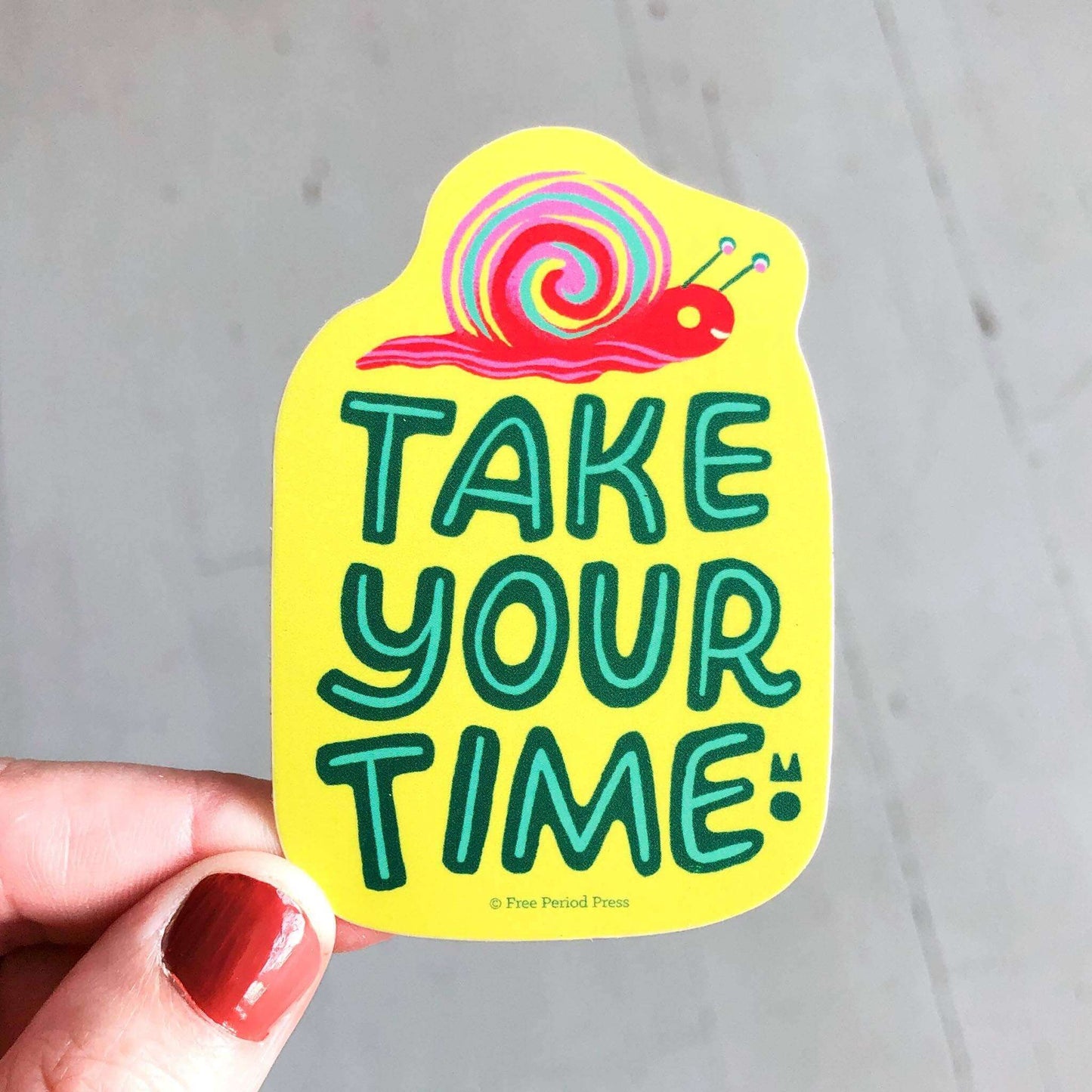 Colorful "Take Your Time" vinyl decal sticker with hand-lettered text and a cute snail, perfect for journaling, notebooks, and more.