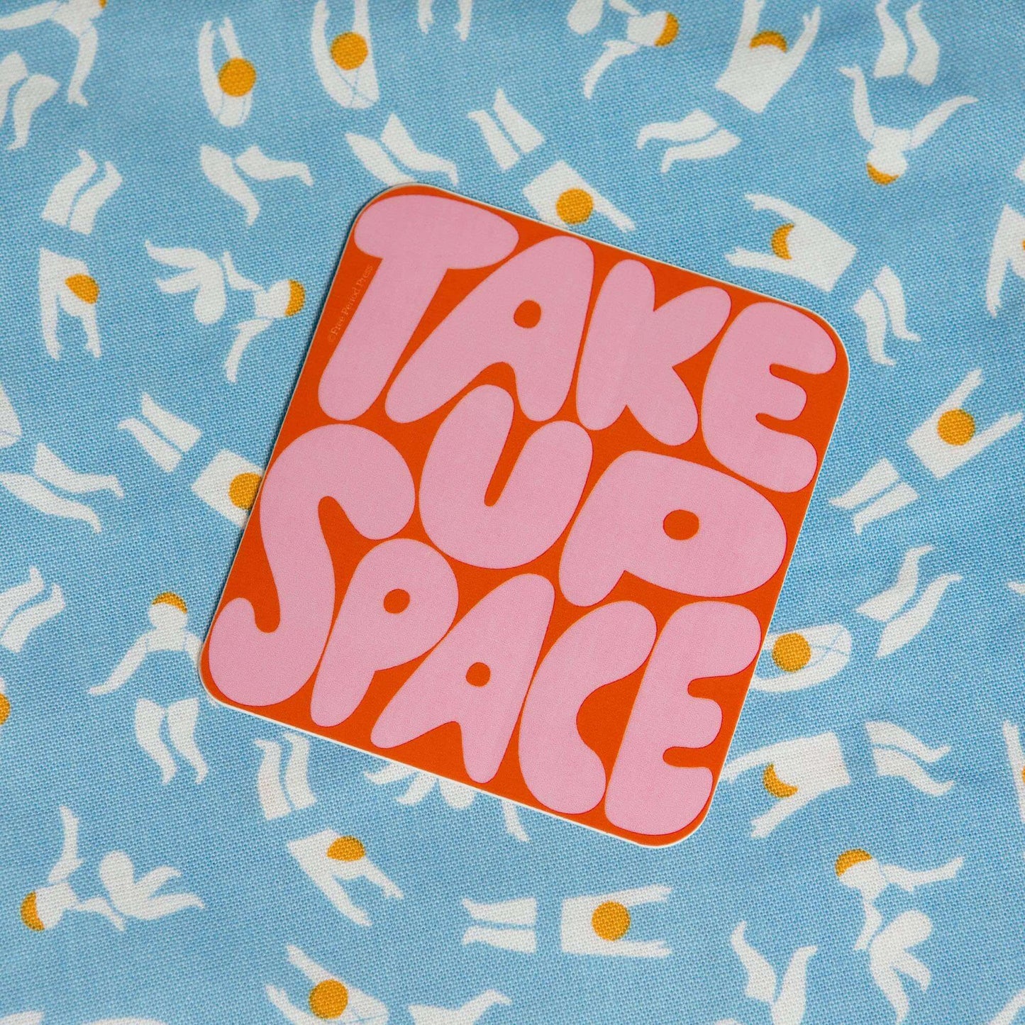 "Take Up Space Vinyl Decal Sticker on a blue patterned background, ideal for journaling and adding personality to your journal supplies"