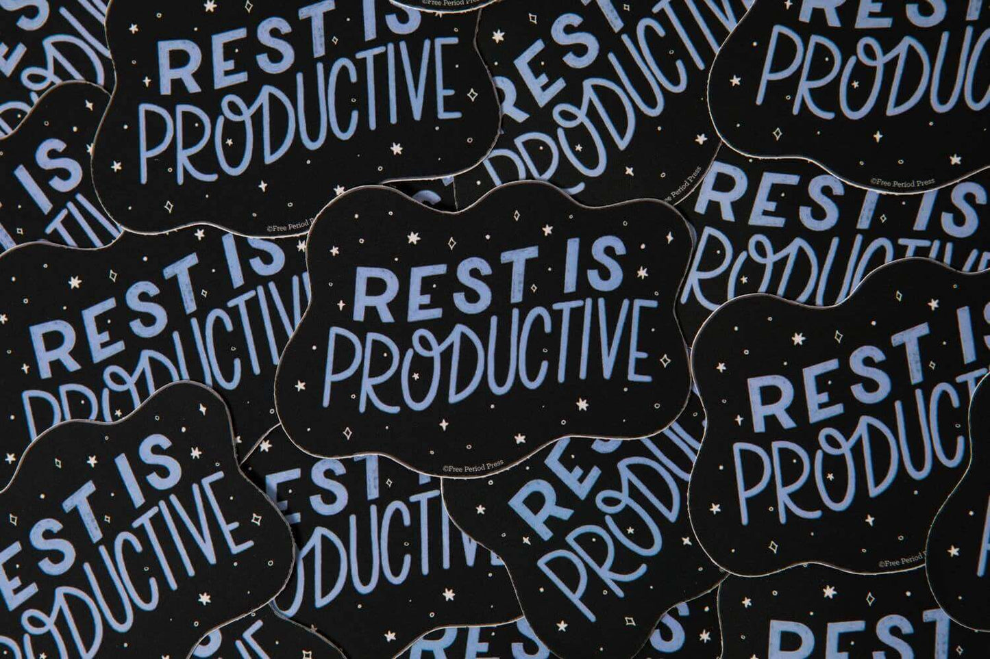 "Rest is Productive vinyl decal stickers with a night sky design perfect for laptops, water bottles, journaling supplies, and more."