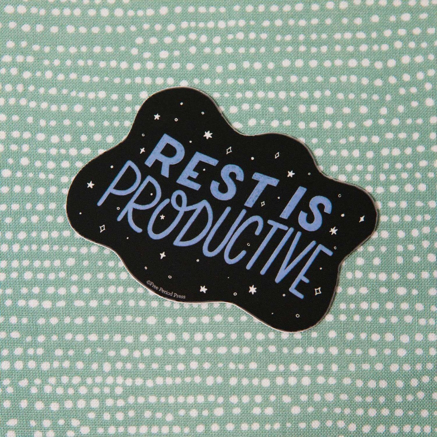 "Rest is Productive" vinyl decal sticker on green dotted background, perfect for journaling supplies like laptops, water bottles, and Yetis