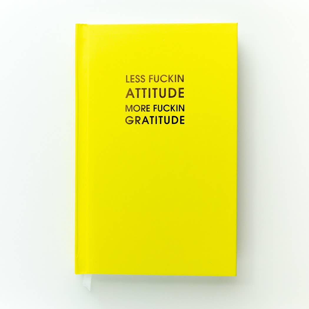 Bright neon yellow hardcover journal with bold text "Less Attitude More Gratitude". 256 lined pages, perfect for journaling prompts and guided journaling.