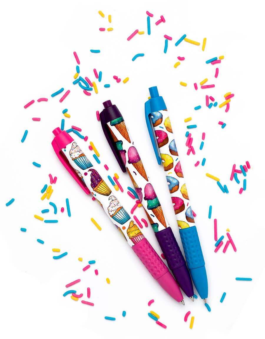 Sweet Treats Scented Pen Set with cupcake, donut, and ice cream designs, perfect for journaling, surrounded by colorful sprinkles.