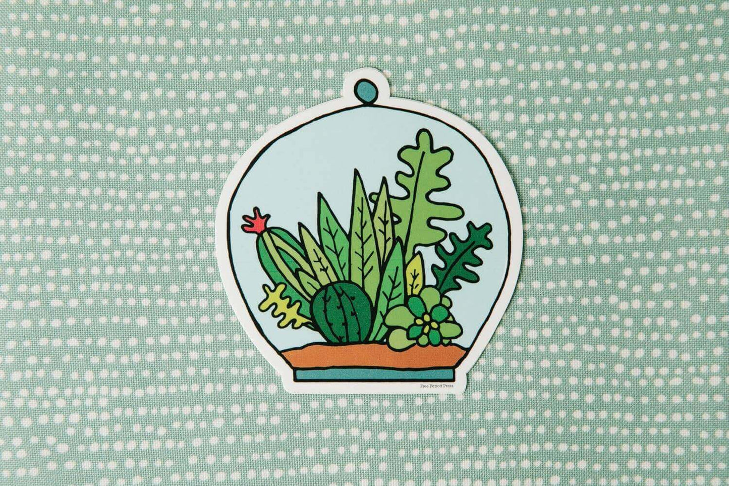 Succulent Terrarium Vinyl Decal Sticker on dotted background, perfect for journaling supplies and adding a unique touch to belongings.