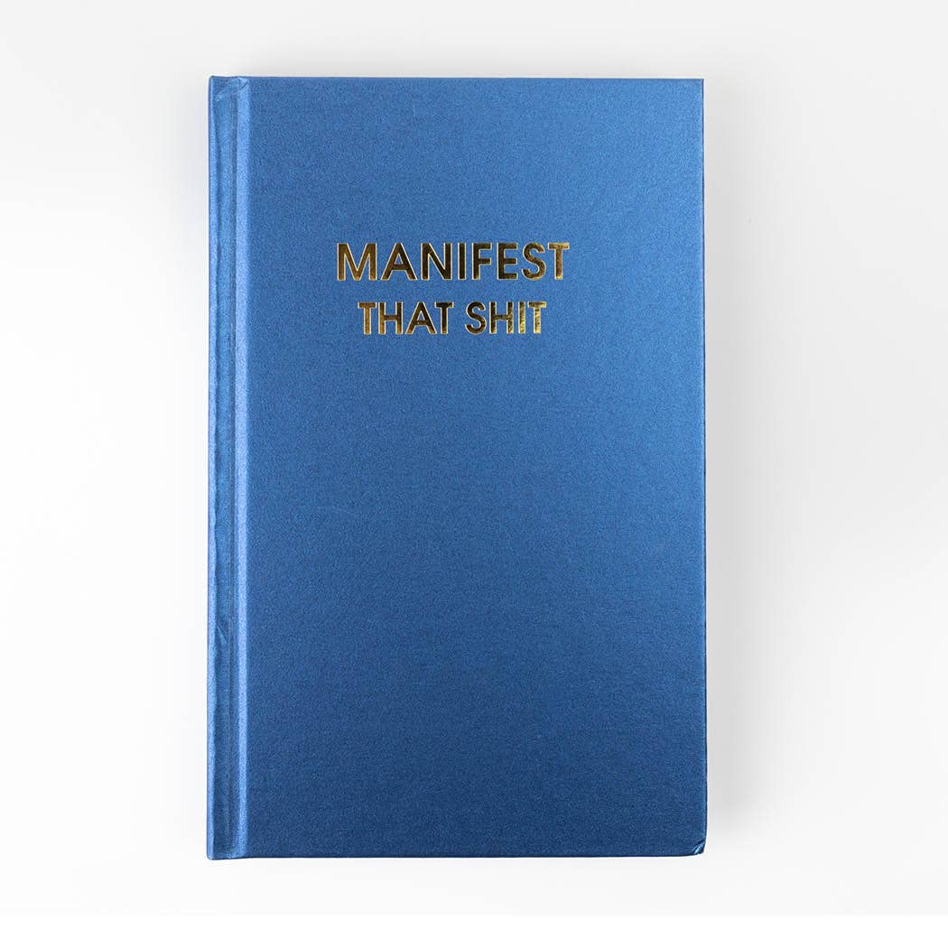 Midnight blue "Manifest That Shit" hardcover journal with gold foil text, perfect for journaling and guided journal prompts.