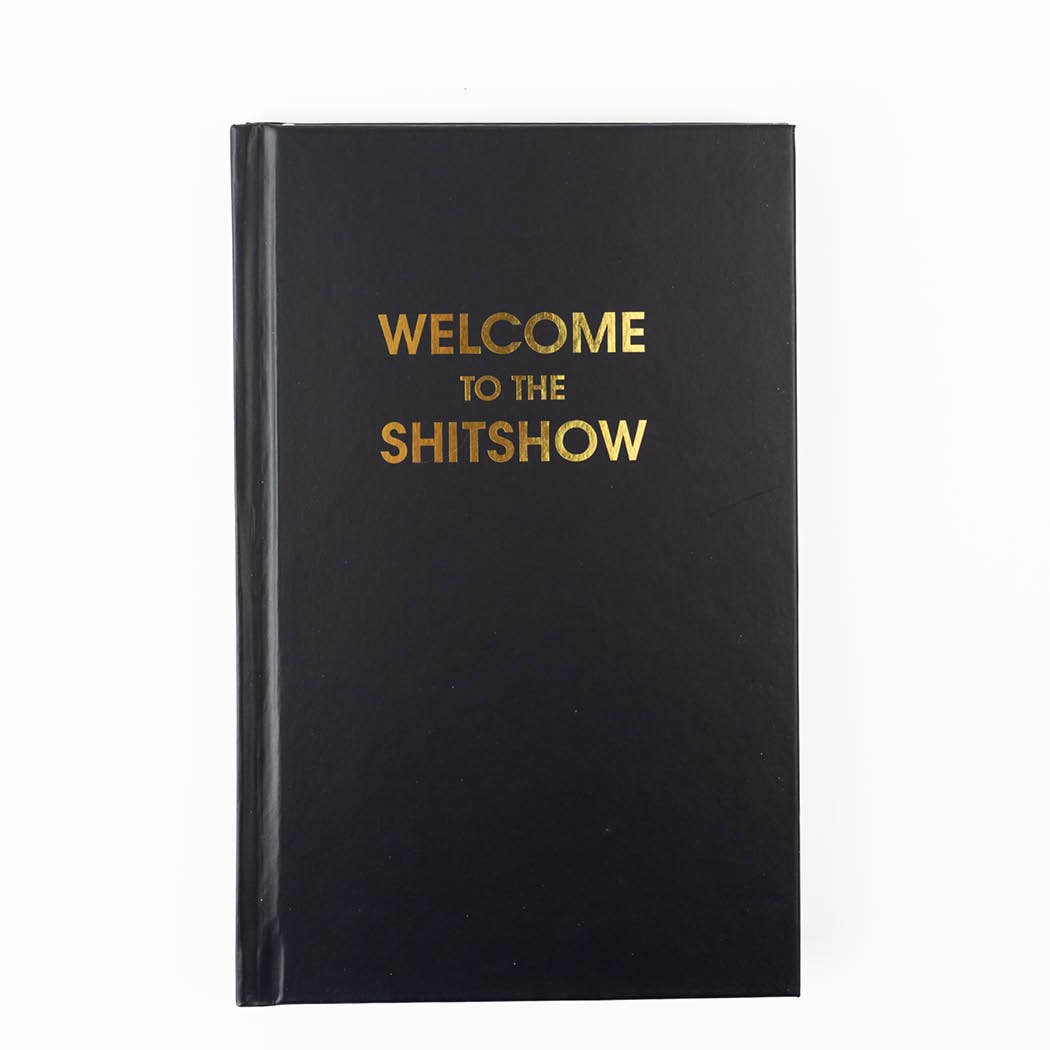 "Welcome to the S***show" journal, bright hardcover, metallic black cover with gold foil text, perfect for journaling and journal prompts.