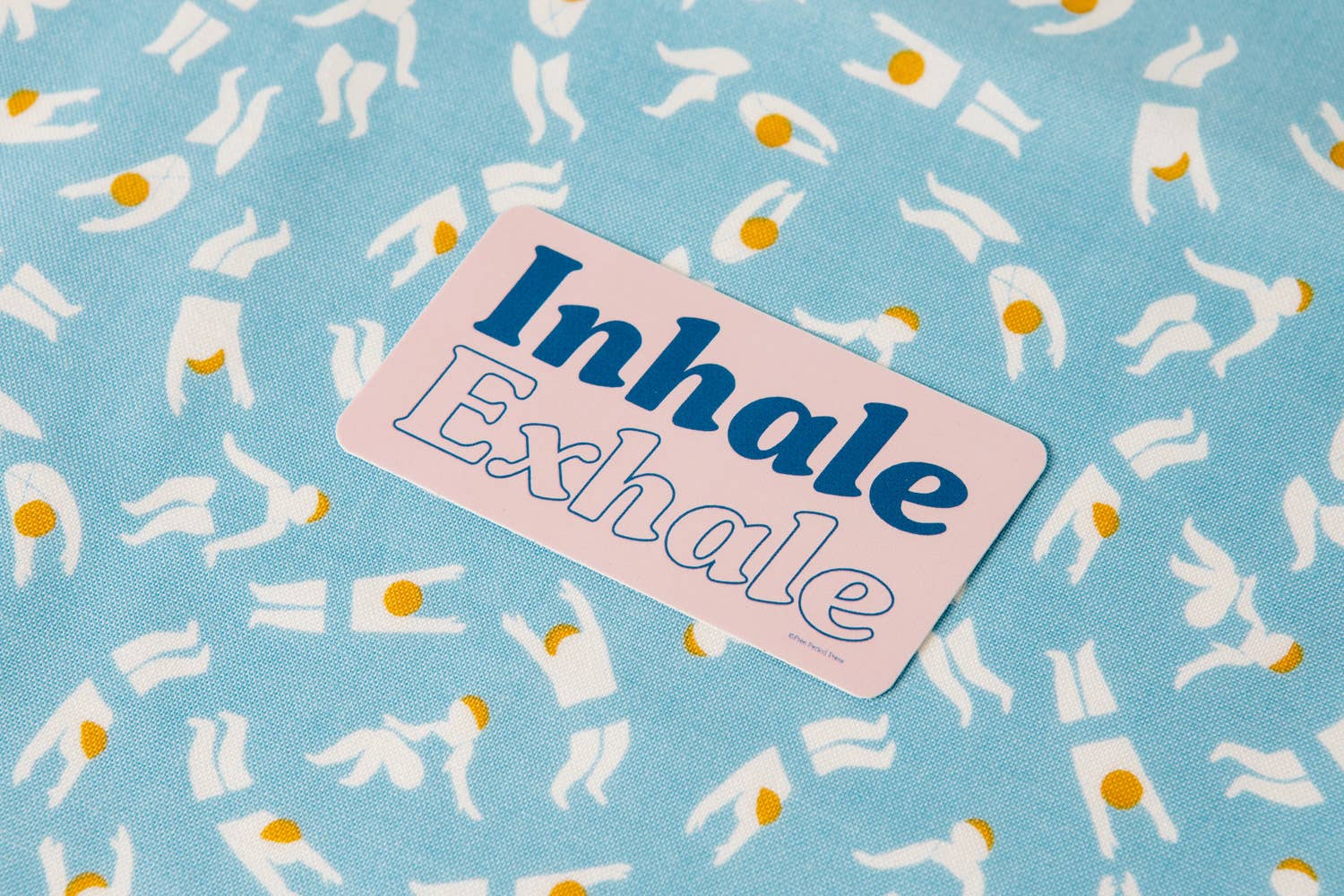 "Inhale Exhale vinyl decal sticker on a blue patterned background, perfect for journaling supplies, journal prompts, and guided journaling."