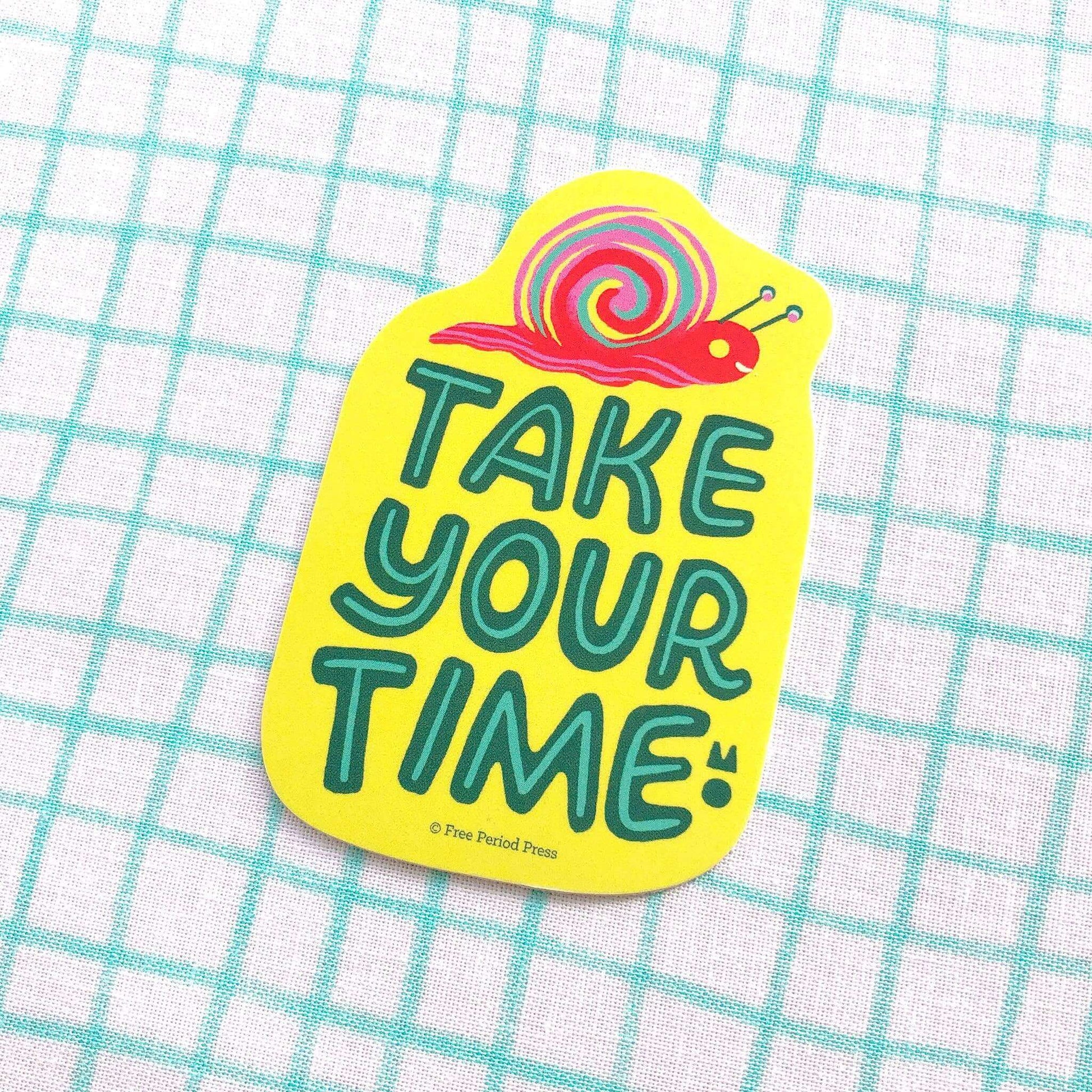 Bright "Take Your Time" vinyl decal sticker with a hand-lettered message and a cute snail, perfect for journaling supplies and notebooks.