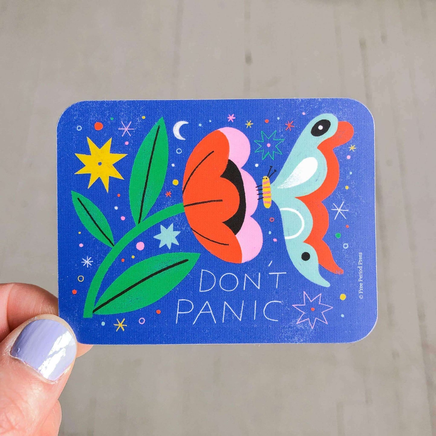 "Don't Panic vinyl decal sticker featuring a colorful butterfly and flower design, perfect for journaling supplies and guided journaling"