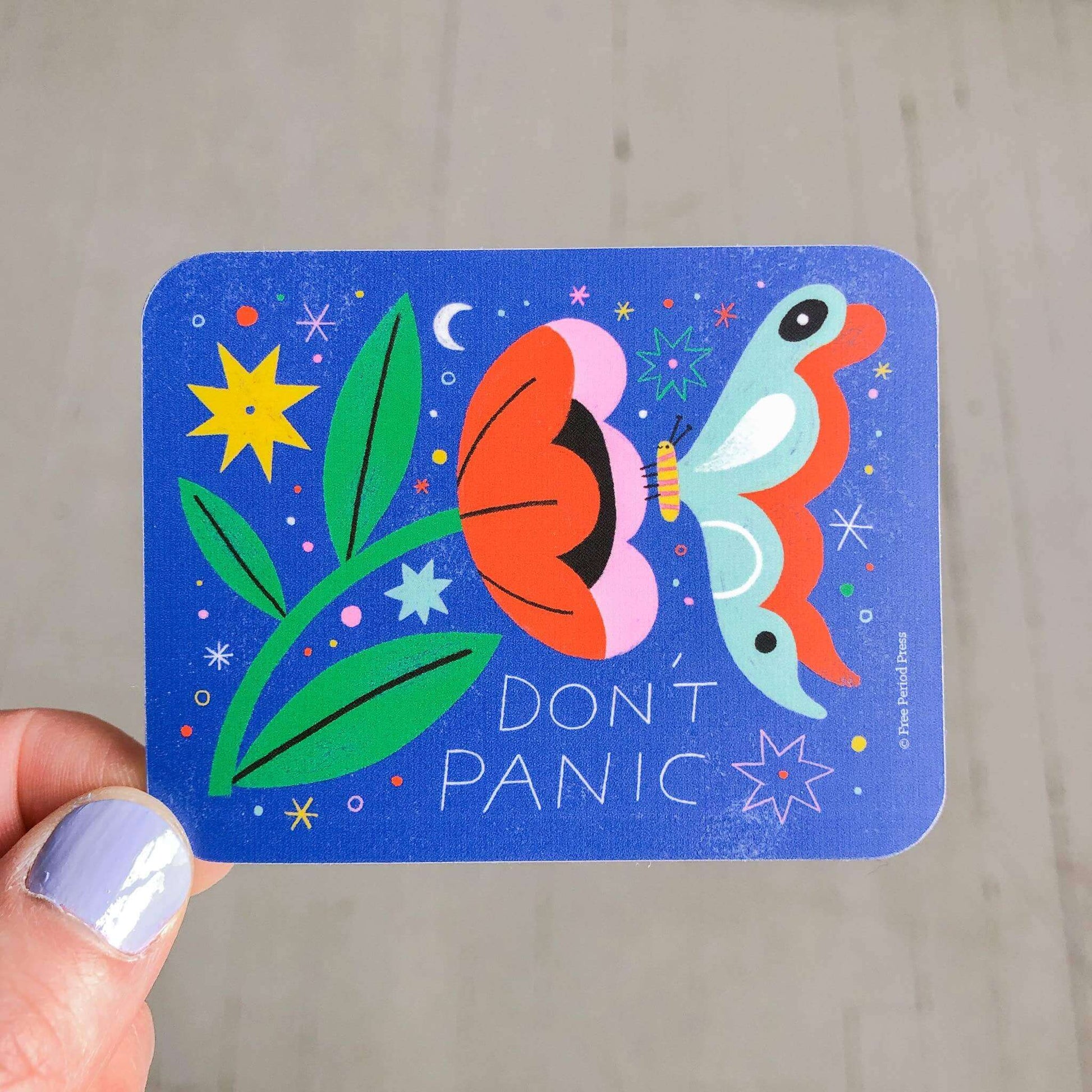 Cheerful "Don't Panic" vinyl decal with colorful butterfly and flower design, perfect for journaling and decorating laptops, notebooks, and more.