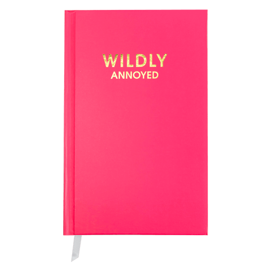 Wildly Annoyed hot pink hardcover journal with gold foil print. Perfect for journaling with 256 lined pages and white page marking ribbon.