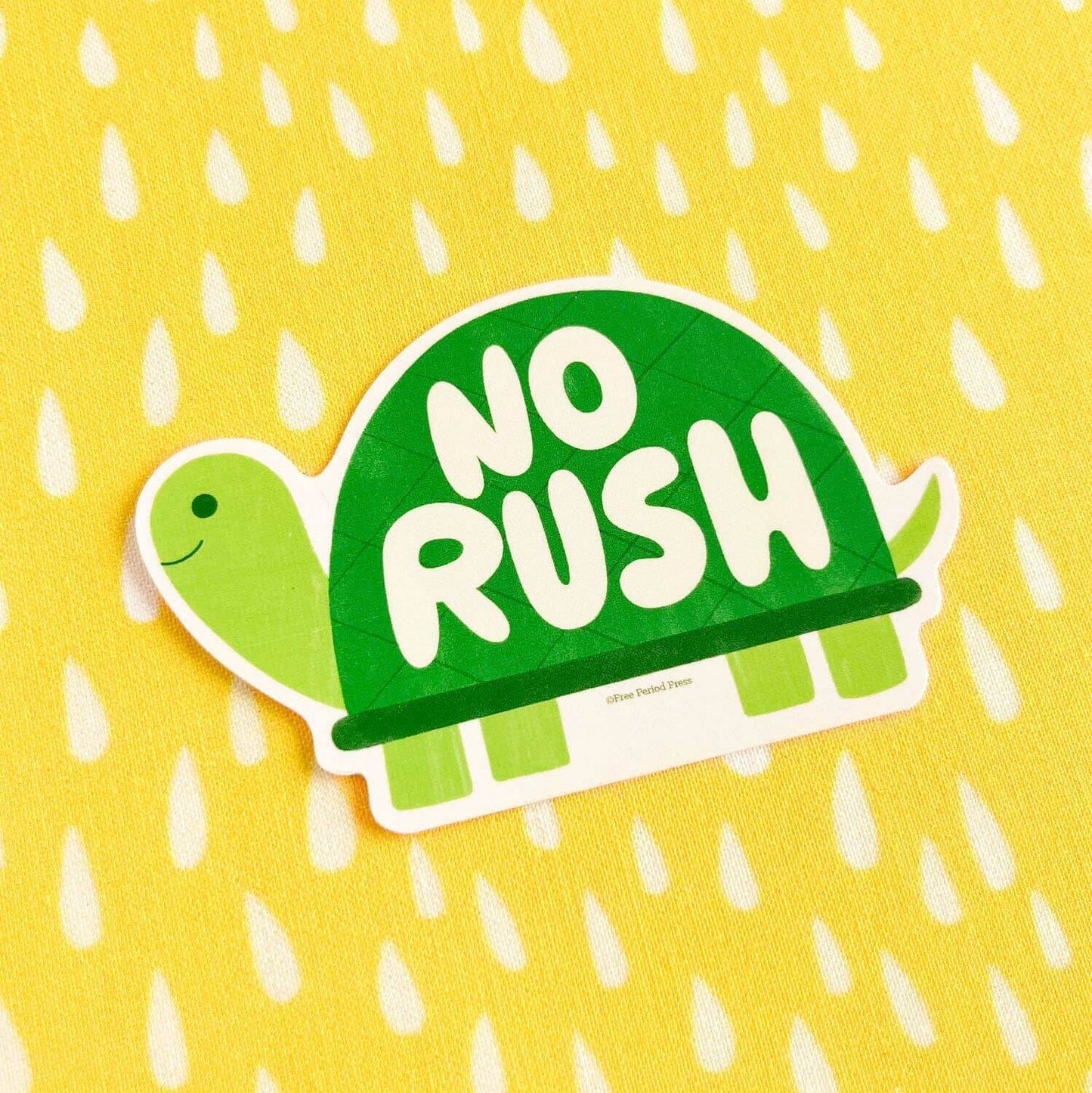 "No Rush Vinyl Decal Sticker with green turtle design on yellow background – perfect for laptops and journal supplies"