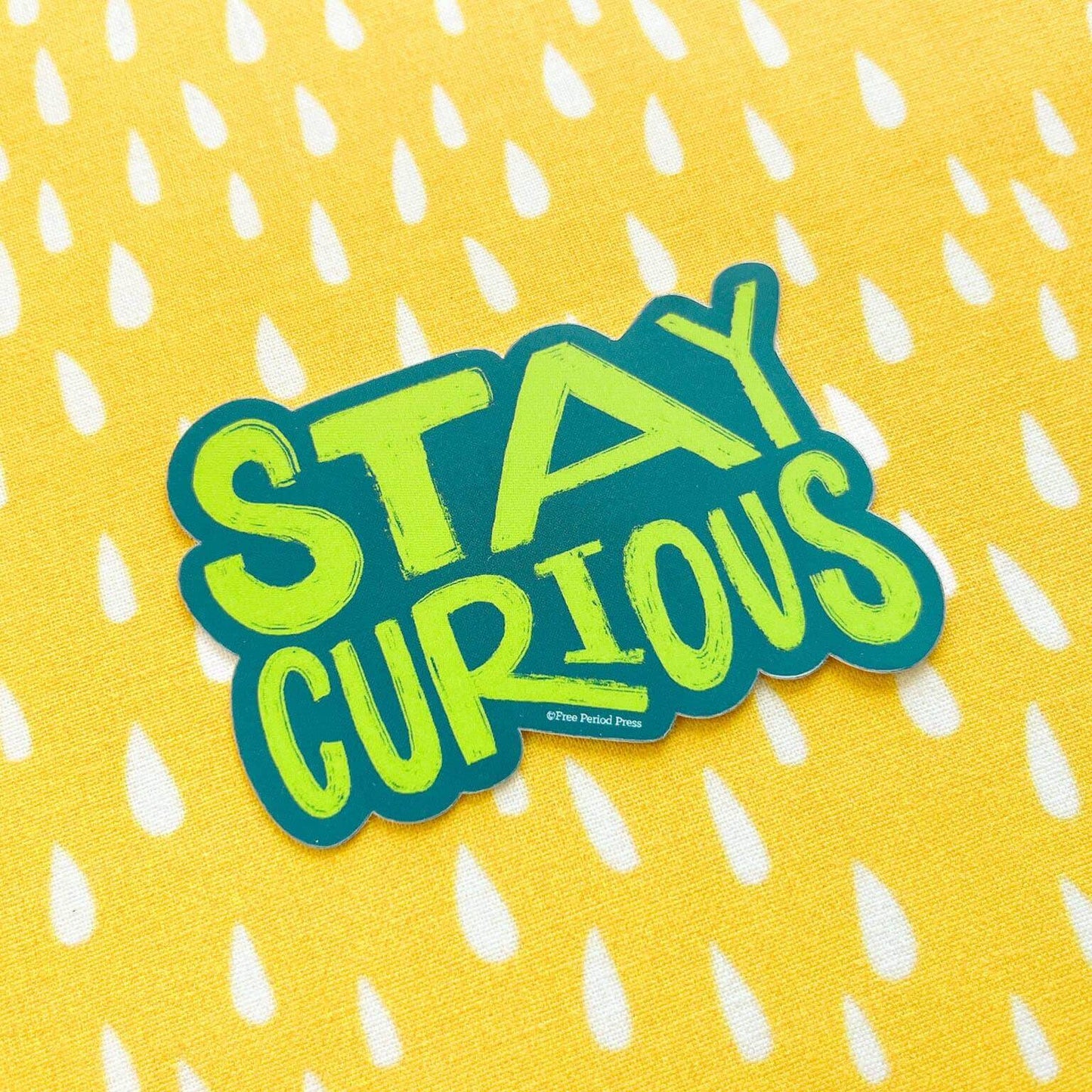 Stay Curious Vinyl Decal Sticker for journaling and journal prompts on a yellow raindrop background. Embrace new knowledge!