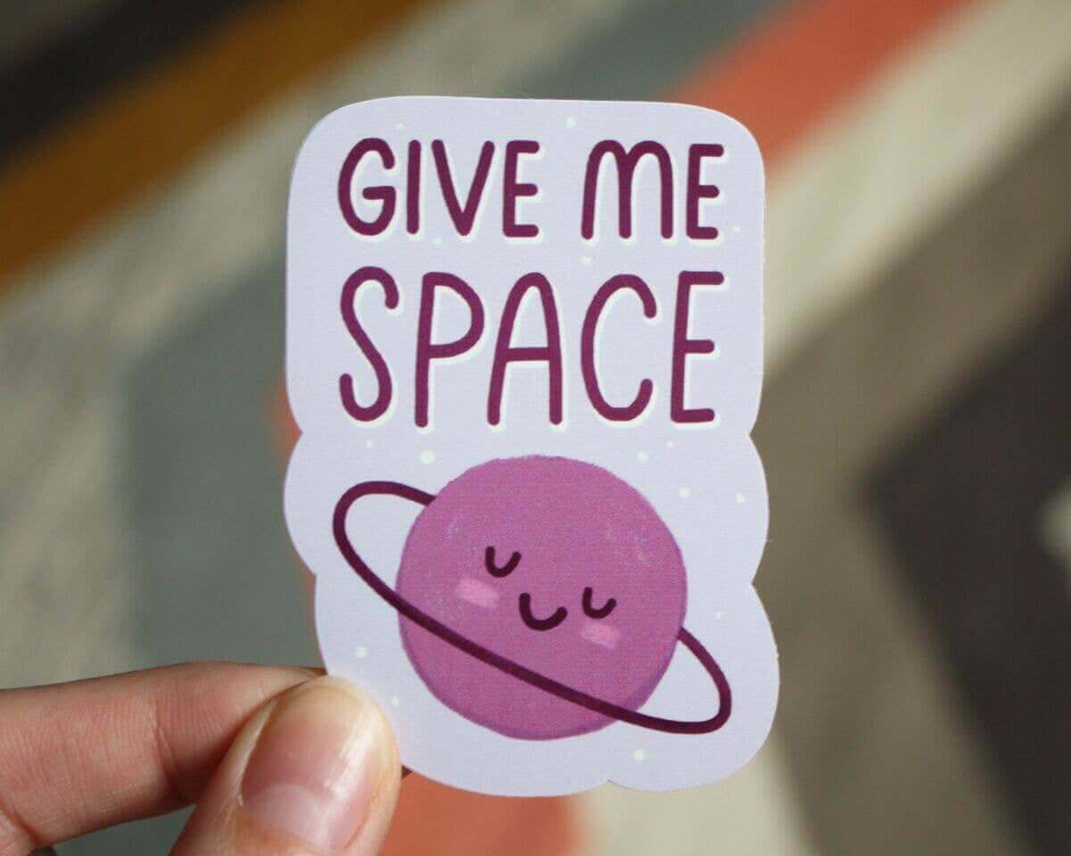 "Charming Give Me Space Vinyl Decal Sticker held up close, perfect for laptops, journals, planners, and more - Ideal for journaling enthusiasts!"