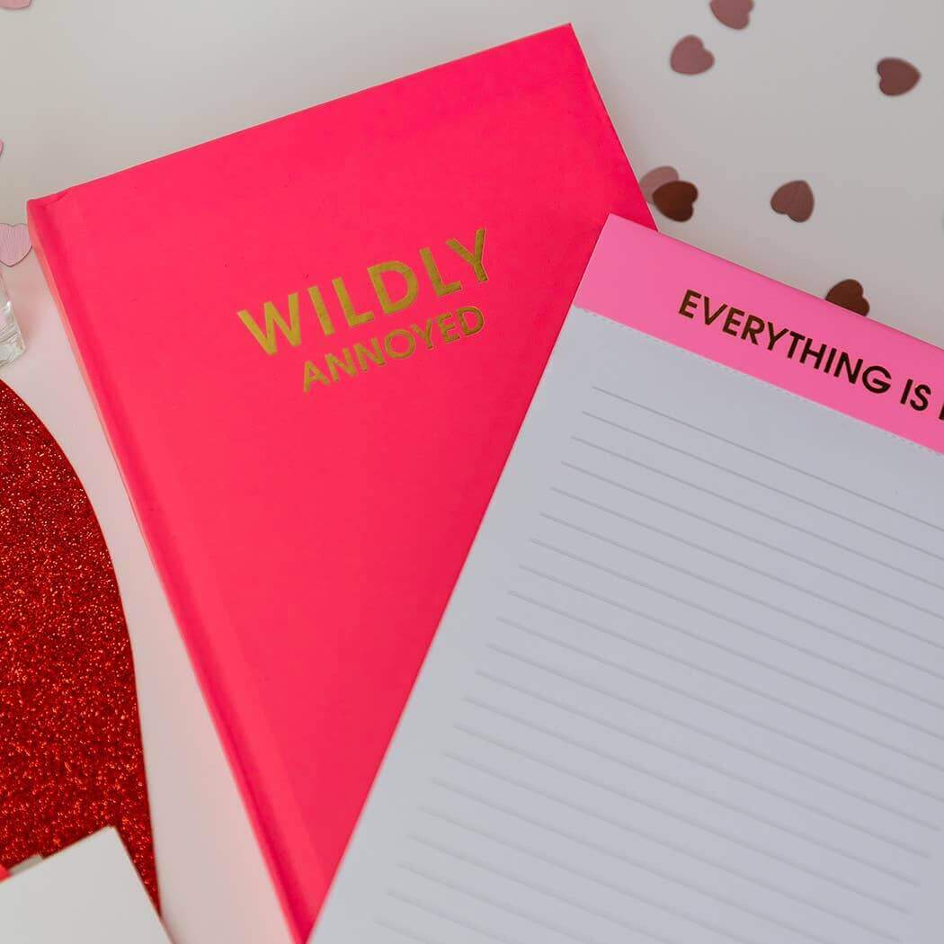 Wildly Annoyed hot pink hardcover journal for authentic self-expression, perfect for journaling, journal prompts, and guided journaling.