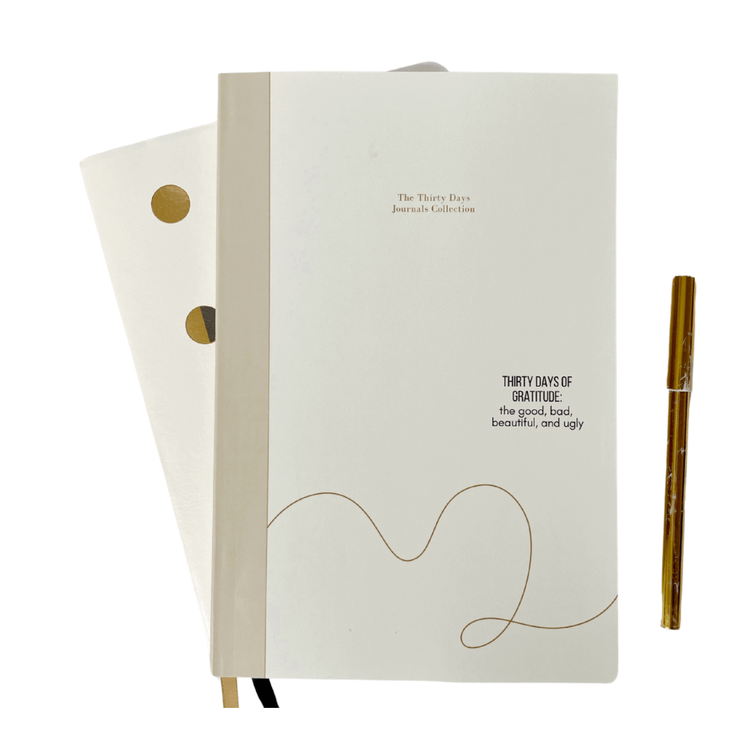 "Thirty Days of Gratitude journal with a pen, perfect for reflecting on the good, bad, beautiful, and ugly aspects of life through journaling"